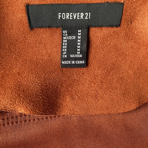 FOREVER 21
Jacket size M 
Brown color - front zipper - pocket - Picture 13 of 16